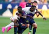 LA Galaxy defender Sega Coulibaly, center, collides with LA Galaxy defender Abdoulaye Cissoko, left, as midfielder Joao Paulo runs behind during the first half of a Major League Soccer match Saturday, June 19, 2021, in Carson, Calif. (AP Photo/Mark J. Terrill)