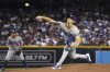 Los Angeles Dodgers pitcher Walker Buehler throws against the Arizona Diamondbacks in the first inning during a baseball game, Saturday, June 19, 2021, in Phoenix. (AP Photo/Rick Scuteri)