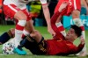 Spain's Alvaro Morata, center, fights for the ball with Poland's Jan Bednarek, right, and Kamil Glik during the Euro 2020 soccer championship group E match between Spain and Poland at La Cartuja stadium in Seville, Spain, Saturday, June 19, 2021. (AP Photo/Thanassis Stavrakis, Pool)
