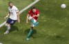 Hungary's Adam Nagy kicks the ball clear as France's Karim Benzema, left, watches during the Euro 2020 soccer championship group F match between Hungary and France at the Ferenc Puskas stadium in Budapest, Hungary, Saturday, June 19, 2021. (AP Photo/Laszlo Balogh,Pool)