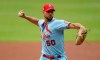 St. Louis Cardinals pitcher Adam Wainwright works against the Atlanta Braves in the first inning of the first baseball game of a double header Saturday, June 19, 2021, in Atlanta. (AP Photo/Ben Margot)