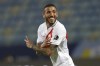 Peru's Sergio Pena celebrates after scoring his side's opening goal during a Copa America soccer match against Colombia at Olimpico stadium in Goiania, Brazil, Sunday, June 20, 2021. (AP Photo/Eraldo Peres)