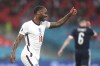 England's Raheem Sterling fives his thumb up during the Euro 2020 soccer championship group D match between England and Scotland at Wembley stadium in London, Friday, June 18, 2021. (Carl Recine /Pool Photo via AP)