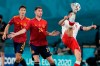 Poland's Robert Lewandowski, right, controls the ball as Spain's Aymeric Laporte, center, and Pau Torres watch during the Euro 2020 soccer championship group E match between Spain and Poland at La Cartuja stadium in Seville, Spain, Saturday, June 19, 2021. (AP Photo/Thanassis Stavrakis, Pool)