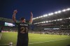 Austin FC's Zan Kolmanic raises his arms before a corner kick during an MLS soccer match against the San Jose Earthquakes on Saturday, June 19, 2021, in Austin, Texas. (Aaron Martinez/Austin American-Statesman via AP)