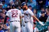 Cleveland Indians' Bobby Bradley, right, celebrates with Josh Naylor after they scored on Naylor's two-run home run off Chicago Cubs starting pitcher Albert Alzolay during the fifth inning of a baseball game Monday, June 21, 2021, in Chicago. (AP Photo/Charles Rex Arbogast)