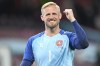 Denmark's goalkeeper Kasper Schmeichel celebrates after the Euro 2020 soccer championship group B match between Russia and Denmark at the Parken stadium in Copenhagen, Denmark, Monday, June 21, 2021. Denmark won 4-1. (Stuart Franklin/Pool via AP)