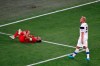 Belgium's Eden Hazard, left, grimaces in pain after a challenge during the Euro 2020 soccer championship group B match between Finland and Belgium at Saint Petersburg Stadium in St. Petersburg, Russia, Monday, June 21, 2021. (Anton Vaganov/Pool Photo via AP)