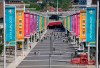 FILE - In this Wednesday, June 9, 2021 file photo,a view of the entrance path to Wembley stadium, ahead of the upcoming Euro 2020 soccer championship in London. The British government says more than 60,000 fans will be allowed into the semifinals and final of the European Championship at Wembley Stadium. No details have been provided yet on how fans from overseas can attend without having to quarantine after flying into London. (AP Photo/Frank Augstein, File)