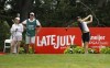 Jeongeun Lee6, of South Korea, right, hits a tee shot on the eighth hole as Jin Young Ko, left, also of South Korea, watches during the final round of the Meijer LPA Classic golf tournament, Sunday, June 20, 2021, in Grand Rapids, Mich. (AP Photo/Al Goldis)