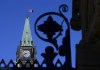 The Canadian flag on the Peace Tower flies at half-mast on Parliament Hill in Ottawa on Wednesday, June 2, 2021. THE CANADIAN PRESS/Sean Kilpatrick