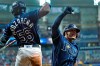 Tampa Bay Rays' Wander Franco celebrates his three-run home run off Boston Red Sox starting pitcher Eduardo Rodriguez with Randy Arozarena (56) during the fifth inning of a baseball game Tuesday, June 22, 2021, in St. Petersburg, Fla. (AP Photo/Chris O'Meara)
