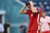 Poland's Robert Lewandowski reacts at the end of the Euro 2020 soccer championship group D match between Sweden and Poland, at the St. Petersburg stadium in St. Petersburg, Russia, Wednesday, June 23, 2021. Sweden won 3-2. (AP Photo/Kirill Kudryavtsev, Pool)