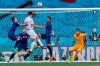 Spain's Aymeric Laporte, left, heads the ball to score his side's second goal during the Euro 2020 soccer championship group E match between Spain and Slovakia at La Cartuja stadium in Seville, Wednesday, June 23, 2021. (AP Photo/Jose Manuel Vidal, Pool)