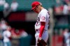 Los Angeles Angels starting pitcher Shohei Ohtani rubs his neck before pitching during the first inning of a baseball game against the San Francisco Giants Wednesday, June 23, 2021, in Anaheim, Calif. (AP Photo/Mark J. Terrill)