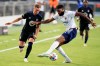 CF Montreal midfielder Djordje Mihailovic, left, and D.C. United defender Donovan Pines battle for the ball, Wednesday, June 23, 2021, during the first half of an MLS soccer match in Fort Lauderdale, Fla. (AP Photo/Wilfredo Lee)