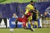 Toronto FC forward Ayo Akinola, bottom, battles Nashville SC midfielder Anibal Godoy, top, for the ball during the second half of an MLS soccer match Wednesday, June 23, 2021, in Nashville, Tenn. Nashville SC won 3-2. (AP Photo/Mark Humphrey)