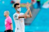 Spain's Sergio Busquets applauds at the end of the Euro 2020 soccer championship group E match between Spain and Slovakia at La Cartuja stadium in Seville, Wednesday, June 23, 2021. (AP Photo/Jose Manuel Vidal, Pool)