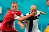 Russia's Dmitri Barinov, left, fouls Finland's Teemu Pukki during the Euro 2020 soccer championship group B match between Russia and Finland at the Saint Petersburg stadium, in St. Petersburg, Russia, Wednesday, June 16, 2021. (AP Photo/Dmitri Lovetsky, Pool)