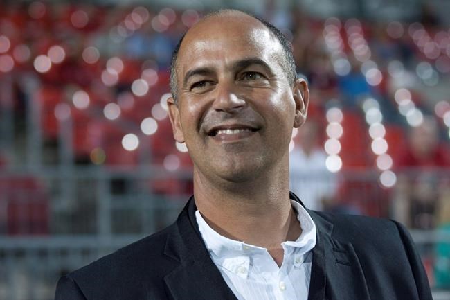 Canada's coach Stephen Hart stands on the touchline ahead of the 2014 World Cup qualifying game against St. Lucia in Toronto on Friday September 2, 2011. THE CANADIAN PRESS/Chris Young