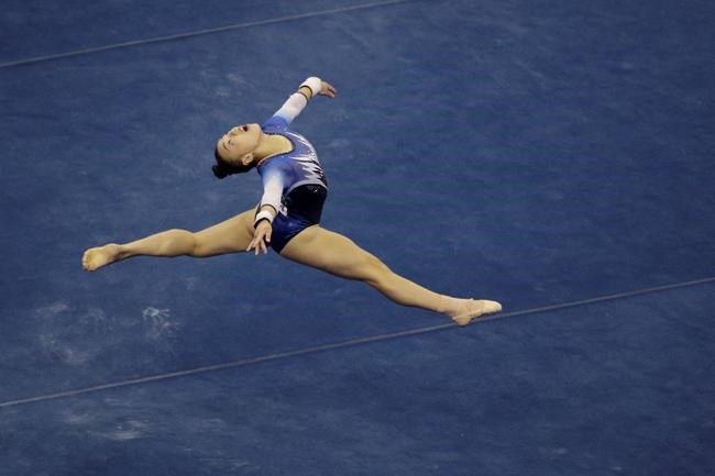 FILE - Emily Lee competes in the floor exercise during the senior women's competition at the 2019 U.S. Gymnastics Championships in Kansas City, Mo., in this Friday, Aug. 9, 2019, file photo. Lee is among the 18 women competing at the 2021 U.S. Olympic Trials in St. Louis starting on Friday night, June 25. (AP Photo/Charlie Riedel, File)