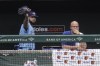 Toronto Blue Jays starting pitcher Alek Manoah, left, reacts in the dugout after he was ejected in the fourth inning of a baseball game, Saturday, June 19, 2021, in Baltimore. The incident happened as a result of Manoah hitting Orioles' Maikel Franco with a pitch after Manoah gave up back-to-back home runs to Ryan Mountcastle and DJ Stewart. Also seen is Blue Jays' catcher Reese McGuire, second from left. (AP Photo/Julio Cortez)