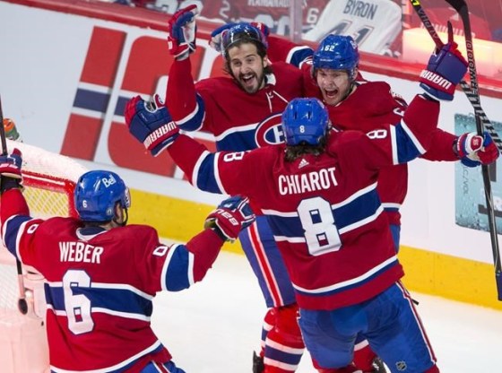 Montreal Canadiens left wing Artturi Lehkonen (62) celebrates with teammates after scoring the winning goal against the Vegas Golden Knights during overtime NHL Stanley Cup playoff hockey semifinal action Thursday, June 24, 2021 in Montreal. THE CANADIAN PRESS/Ryan Remiorz