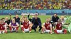 Austria's manager Franco Foda, center, celebrates with his players after winning the Euro 2020 soccer championship group C match between Ukraine and Austria at the National Arena stadium in Bucharest, Romania, Monday, June 21, 2021. (Daniel Mihailescu/Pool Photo via AP)