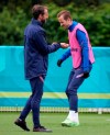 England's Harry Kane, right, and England's manager Gareth Southgate arrive for a team training session at Tottenham Hotspur training ground in London, Monday, June 21, 2021 one day ahead of the Euro 2020 soccer championship group D match against Czech Republic. (AP Photo/Frank Augstein)