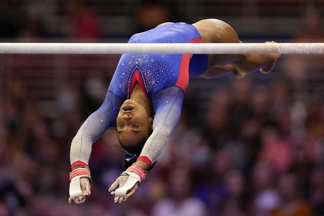 Jordan Chiles competes on the uneven bars during the women's U.S. Olympic Gymnastics Trials Friday, June 25, 2021, in St. Louis. (AP Photo/Jeff Roberson)
