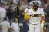 San Diego Padres' Fernando Tatis Jr., tosses his bat after hitting a home run during the first inning of a baseball game against the Arizona Diamondbacks, Friday, June 25, 2021, in San Diego. (AP Photo/Gregory Bull)