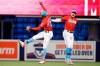 Miami Marlins Jazz Chisholm Jr. (2) and Miguel Rojas (13) react after defeating the Washington Nationals after a baseball game, Saturday, June 26, 2021, in Miami. (AP Photo/Rhona Wise)