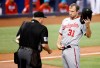Washington Nationals starting pitcher Max Scherzer (31) is check for foreign substances by an umpire following the first inning of a baseball game against the Miami Marlins, Sunday, June 27, 2021, in Miami. (AP Photo/Rhona Wise)