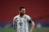Argentina's Lionel Messi looks on at the end of a Copa America soccer match against Paraguay at the National stadium in Brasilia, Brazil, Monday, June 21, 2021. Argentina won 1-0. (AP Photo/Ricardo Mazalan)