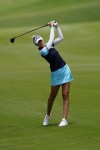 Nelly Korda of the U.S. hits on the fairway of the second hole, during the final round of play in the KPMG Women's PGA Championship golf tournament, Sunday, June 27, 2021, in Johns Creek, Ga. (AP Photo/John Bazemore)