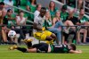 Austin FC forward Jon Gallagher (17) is tripped as he and Columbus Crew defender Harrison Afful (25) vie for the ball during an MLS soccer match, Sunday, June 27, 2021, in Austin, Texas. (AP Photo/Eric Gay)