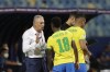 Brazil's coach Tite, left, gives instructions to his player Vinicius Junior during a Copa America soccer match against Ecuador at Olimpico stadium in Goiania, Brazil, Sunday, June 27, 2021. (AP Photo/Eraldo Peres)
