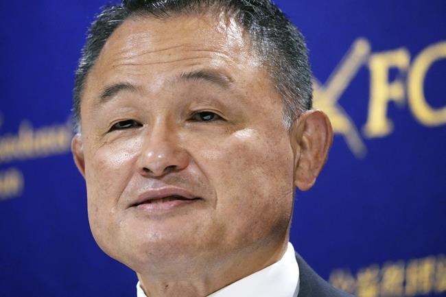 Yasuhiro Yamashita, President of the Japanese Olympic Committee, poses for photographers prior to a press conference Monday, June 28, 2021, in Tokyo, ahead of the opening of Tokyo 2020 Olympic Games on July 23. (AP Photo/Eugene Hoshiko)