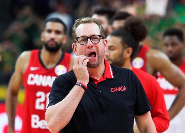 FILE - Canada's coach Nick Nurse gestures during a Group H match against Lithuania at FIBA Basketball World Cup 2019 in Dongguan in south China's Guangdong province, in this Sept. 3, 2019, file photo. Toronto coach Nick Nurse is an American. Born in Iowa. Owns a home in Florida. A lifetime fan of the Chicago Cubs. He also carries Canada’s Olympic hopes. (AP Photo/File)