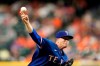 Texas Rangers starting pitcher Kyle Gibson throws against the Houston Astros during the first inning of a baseball game Tuesday, June 15, 2021, in Houston. (AP Photo/David J. Phillip)