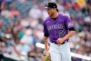 Colorado Rockies starting pitcher Kyle Freeland reacts after getting Pittsburgh Pirates' Ke'Bryan Hayes to ground out to end the top of the fifth inning of a baseball game Monday, June 28, 2021, in Denver. (AP Photo/David Zalubowski)