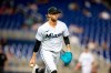 Miami Marlins relief pitcher Adam Cimber (90) tosses a caught ball to first base during the fourth inning of a baseball game against the Washington Nationals on Thursday, June 24, 2021, in Miami. The Toronto Blue Jays have acquired help for their struggling bullpen and also added an outfield bat. Toronto landed right-hander Adam Cimber and outfielder Corey Dickerson in a trade with the Miami Marlins on Tuesday.THE CANADIAN PRESS/AP/Mary Holt