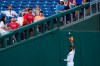 Philadelphia Phillies left fielder Andrew McCutchen catches a fly out by Miami Marlins' Trevor Rogers during the third inning of a baseball game, Tuesday, June 29, 2021, in Philadelphia. (AP Photo/Matt Slocum)