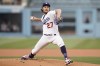 Los Angeles Dodgers starting pitcher Trevor Bauer throws against the San Francisco Giants during the first inning of a baseball game, Monday, June 28, 2021, in Los Angeles. (AP Photo/Jae C. Hong)