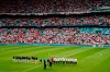Germany's players, right, stand for the national anthem of their country before the Euro 2020 soccer championship round of 16 match between England and Germany, at Wembley stadium, in London, Tuesday, June 29, 2021. (Matthew Childs/Pool via AP)