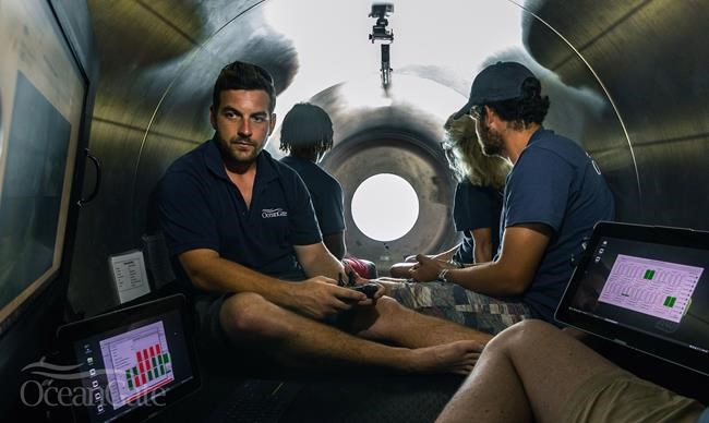 This undated photo provided by OceanGate Expeditions in June 2021 shows the interior of company's Titan submersible.  (OceanGate Expeditions via AP)