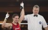 Mandy Bujold, of Ontario, celebrates after defeating Kim Klavel, of Quebec, in their 51kg bout at the Canadian Olympic boxing trials, in Montreal, on December 9, 2015. THE CANADIAN PRESS/Graham Hughes