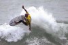 FILE - Surfer Kelly Slater performs during an Olympic exhibition of the USA Surfing Junior championships at the Lower Trestles in San Clemente, Calif., in this Tuesday, June 22, 2021, file photo. There’s a lot riding on surfing’s Olympic debut: a taste of the mainstream spotlight, the athletic legitimacy for the uniquely four-dimensional sport, and, perhaps, some newfound respect so it can finally shake its stereotype as merely the pleasure pursuit of beach town himbos. (Keith Birmingham/The Orange County Register via AP, File)