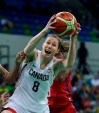 FILE - Canada guard Kim Gaucher pulls down a rebound during the first half of a women's basketball game against the United States at the 2016 Summer Olympics in Rio de Janeiro, Brazil, in this Friday, Aug. 12, 2016, file photo. Canadian basketball player Kim Gaucher, who is breastfeeding her infant daughter, has won in her quest to bring the baby to the Tokyo Olympics.The International Olympic Committee says nursing mothers will now be allowed to bring their babies to Tokyo. (AP Photo/Carlos Osorio, File)