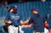 Tampa Bay Rays relief pitcher Ryan Sherriff, left, gets pulled by manager Kevin Cash, right, during the third inning of a baseball game against the Washington Nationals, Wednesday, June 30, 2021, in Washington. (AP Photo/Nick Wass)